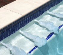 Swimming pool ledges