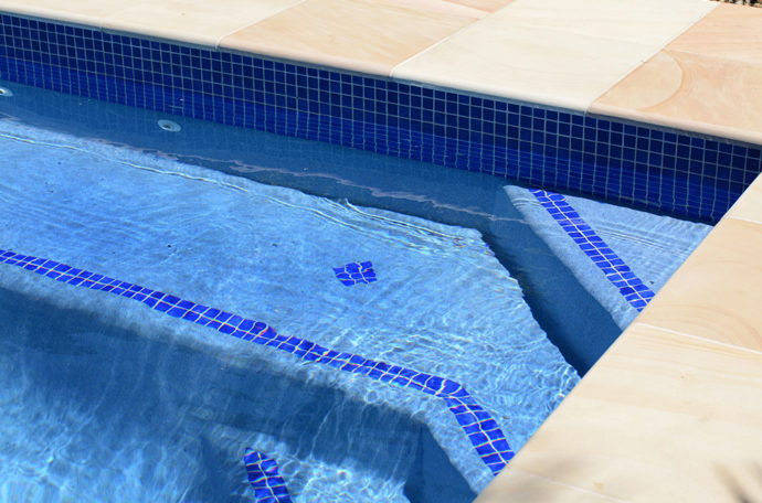 Swimming pool ledges